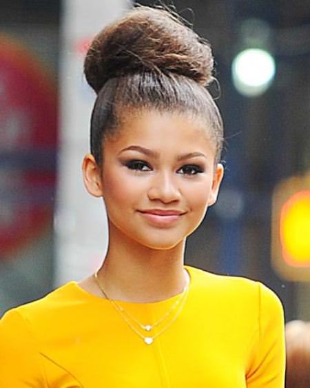 oversized-topknot captivating long hairstyles for black women