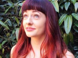 Blunt bangs and length red ombre hair