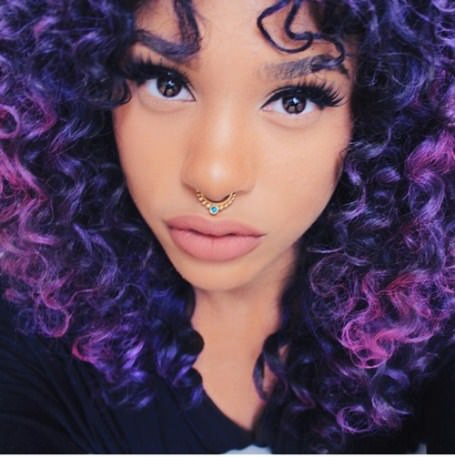 Thick waves with natural colored natural curly hairstyles